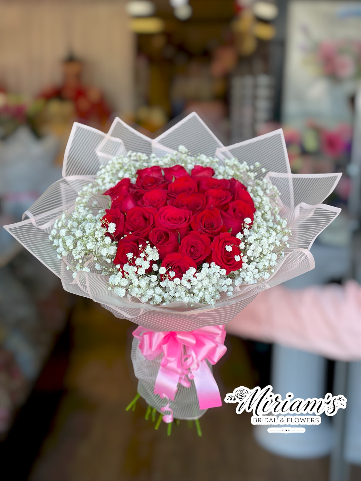 25 Red Roses with Baby Breath wrapped Buchon Style